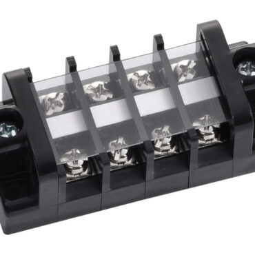 In plastica nera, con fascia trasparente di protezione. Separatori per contatti accidentali. Terminali e viti in ottone nichelato.